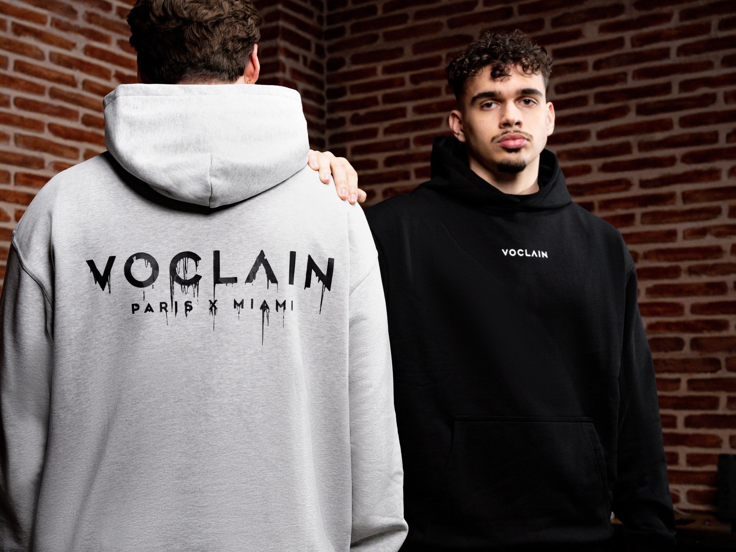 2 Models with Voclain Hoodies 