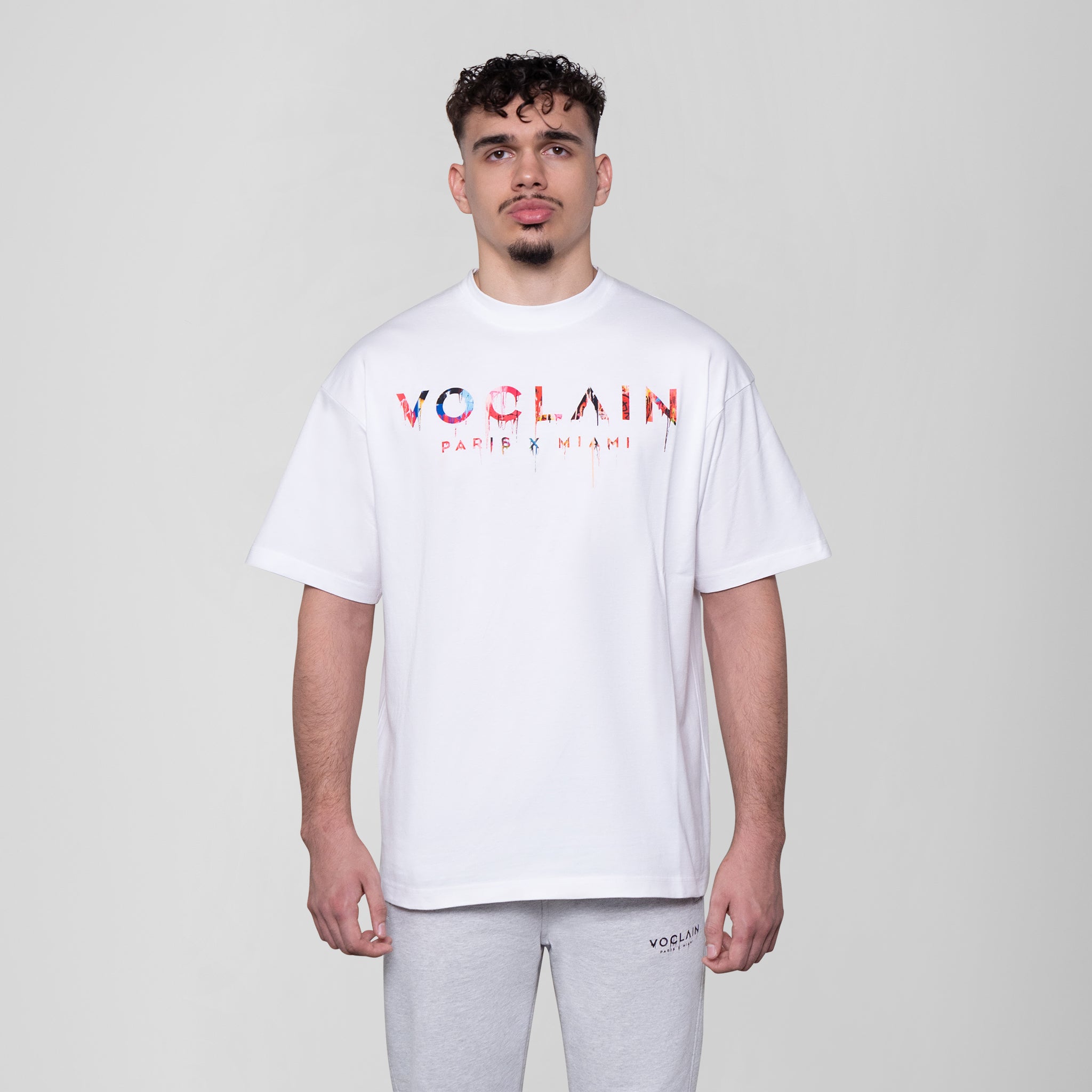 Model with Voclain T-Shirt White Graffiti Drip